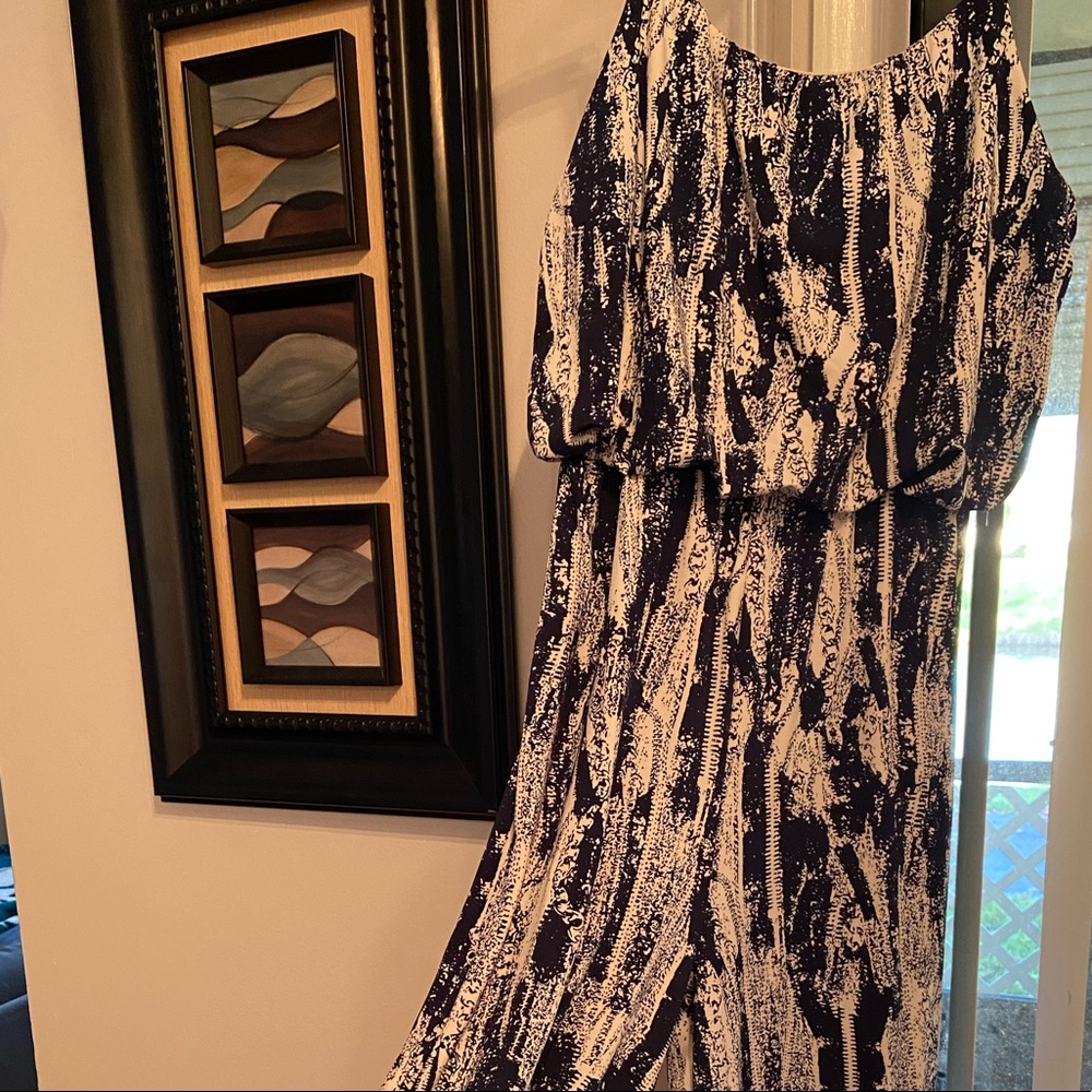 Royal Blue and White floor length jumpsuit with adjustable straps.